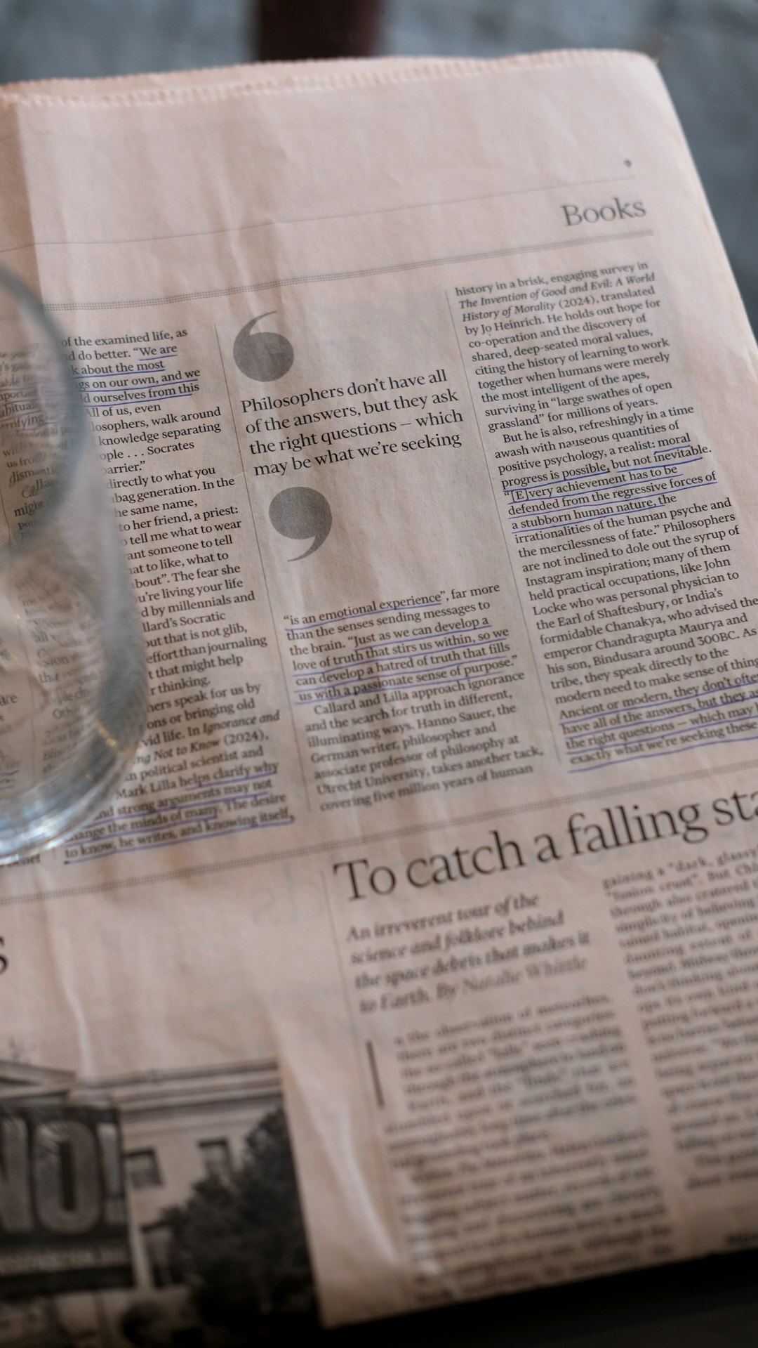 old newspaper clippings on table