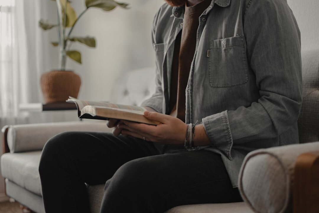 person reading mystery book